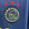 Nuova maglia Ajax 2025-2026 Bob Marley blu stemma