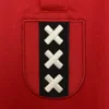 nuova maglia dell’Ajax 2025-2026 rossa stemma