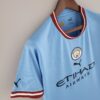 Maglia Manchester City 2022-2023 spalla