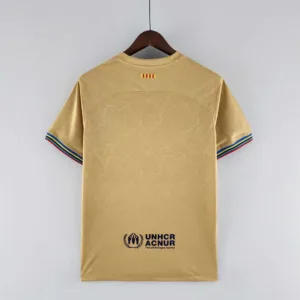 Maglia FC Barcelona Oro 2022-2023 con numero