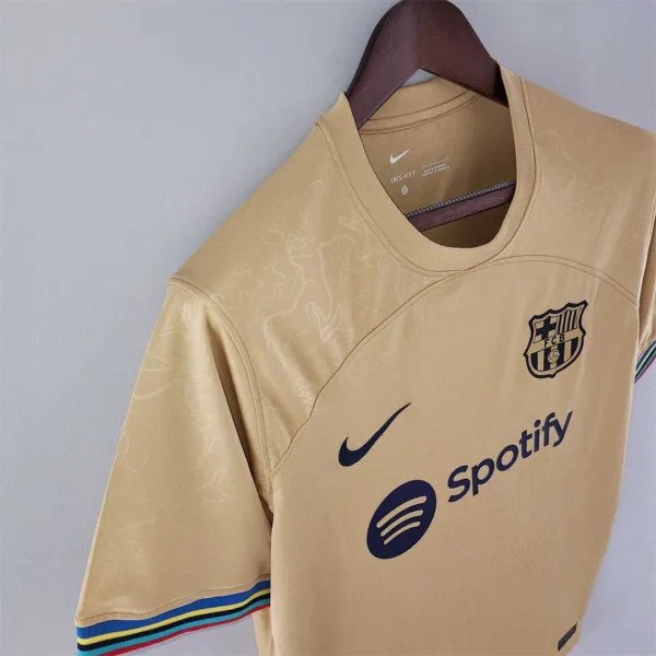 Maglia FC Barcelona Oro 2022-2023 spalla