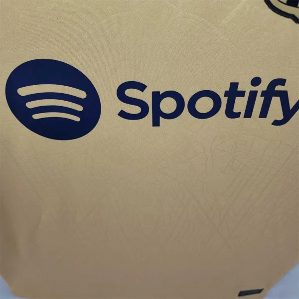 Maglia FC Barcelona Oro 2022-2023 spotify