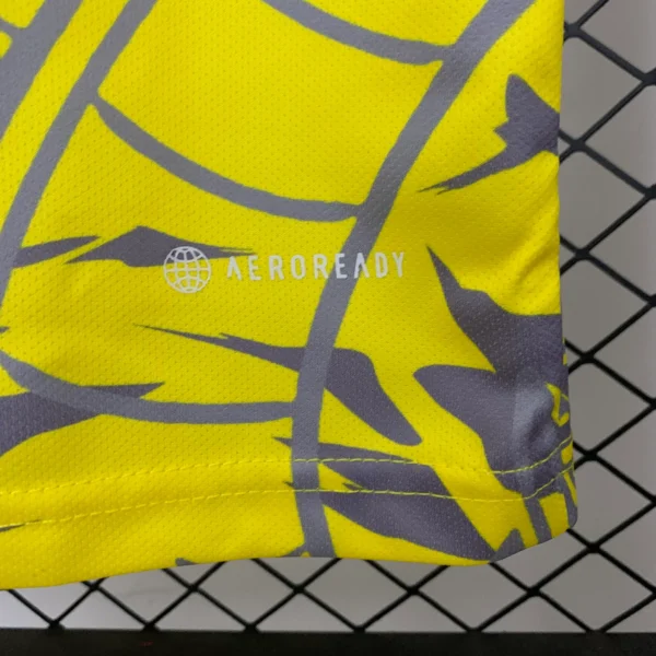 Maglia gialla Real Madrid 2025-2026 dragon materiale