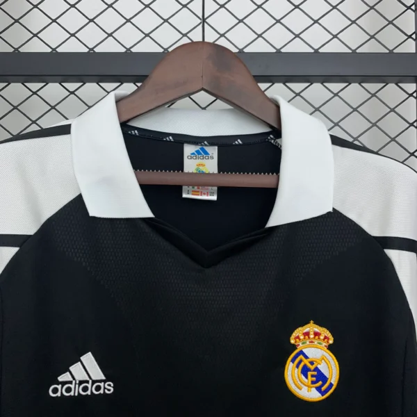 Maglia retro Real Madrid 2001-2002 nera collo
