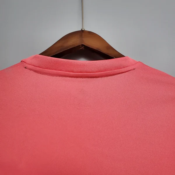 Maglia retro Real Madrid 2020-2021 rosa scollo anteriore