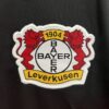 Maglia Bayer Leverkusen 2023-2024 stemma
