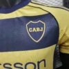 Maglia Boca Juniors Dorata 2025-2026 stemma
