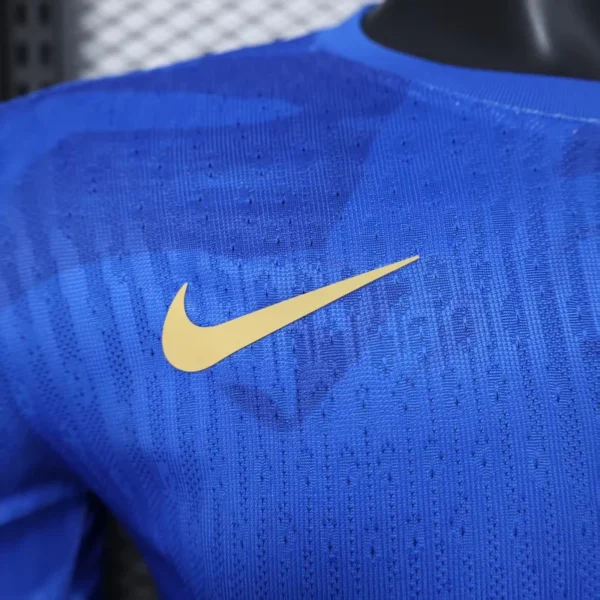 Maglia FC Barcelona blu/rossa 2025-2026 logo