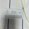 Camiseta blanca retro Real Madrid US Pack 2025 etiqueta