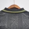 Maglia retro Manchester United nera 1993-1995 collo anteriore