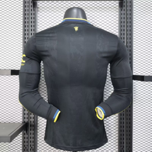 Maglia nera Manchester United manica lunga 2025-2026 con numero