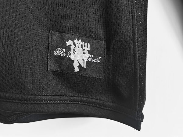 Camiseta retro negra Manchester United manga larga 2007-2008 etiqueta