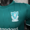 Maglia verde Liverpool 2025-2026 stemma