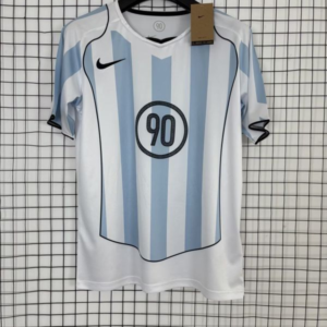 Camiseta Total 90 blanco-celeste 2025-2026