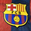 Maglia blaugrana FC Barcelona 2025-2026 stemma