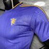 Maglia viola Manchester United 2025-2026 manica