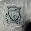 Maglia retrò Liverpool verde e bianca 1995-1996 stemma