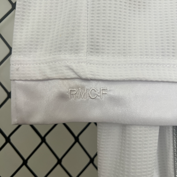 Conjunto retro bambino Real Madrid 2015-2016 angolo