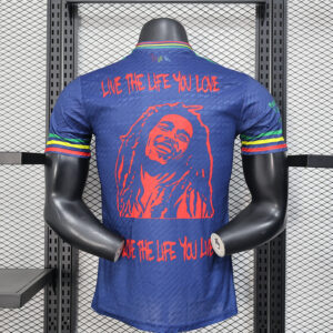 Maglia Ajax Bob Marley 2025-2026 blu con numero