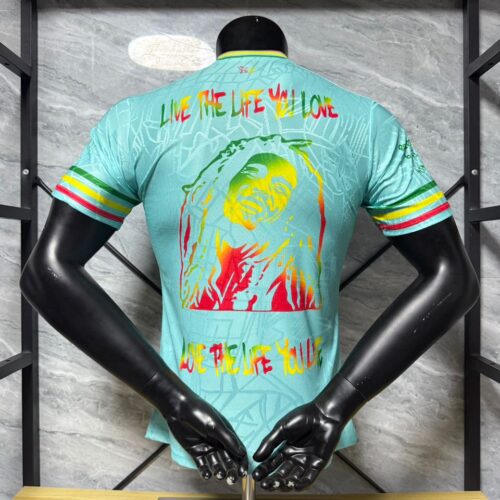 Maglia Ajax Bob Marley 2025-2026 verde con numero